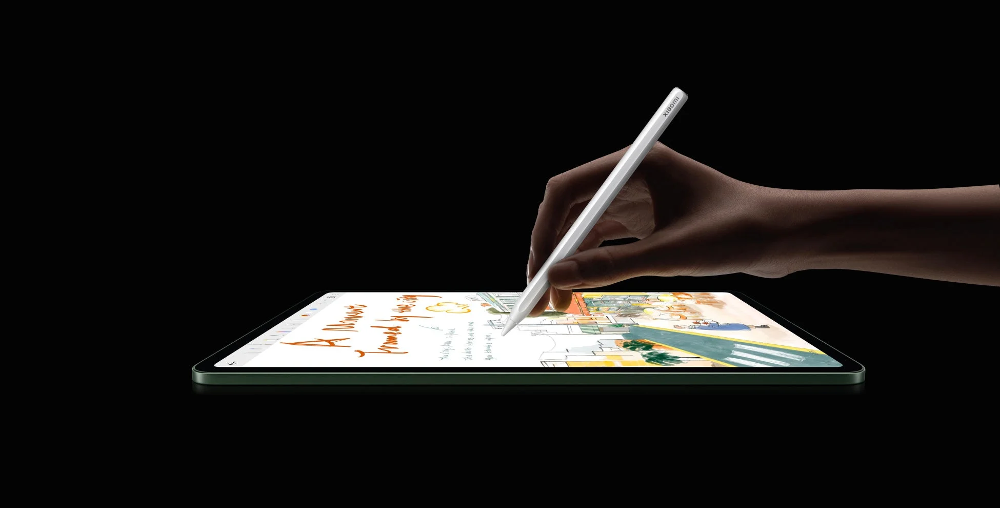 スタイラスペンでタブレットに描画する手元