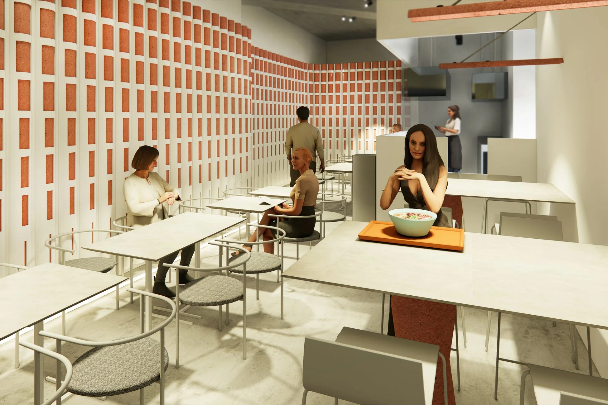 オレンジと白の幾何学模様の壁が特徴的なモダンなレストラン内部