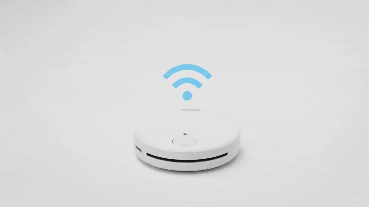 白い背景に、Wi-Fi接続を示す青いアイコンが浮かぶ白い円形のデバイスが配置されています。シンプルでモダンなデザインの無線通信機器です。