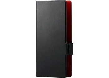 黒い長方形の物体が写っており、片側の側面が鮮やかな赤色