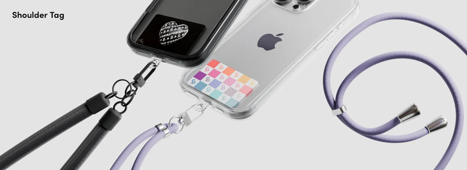 スマートフォンに装着されたショルダーストラップとケース