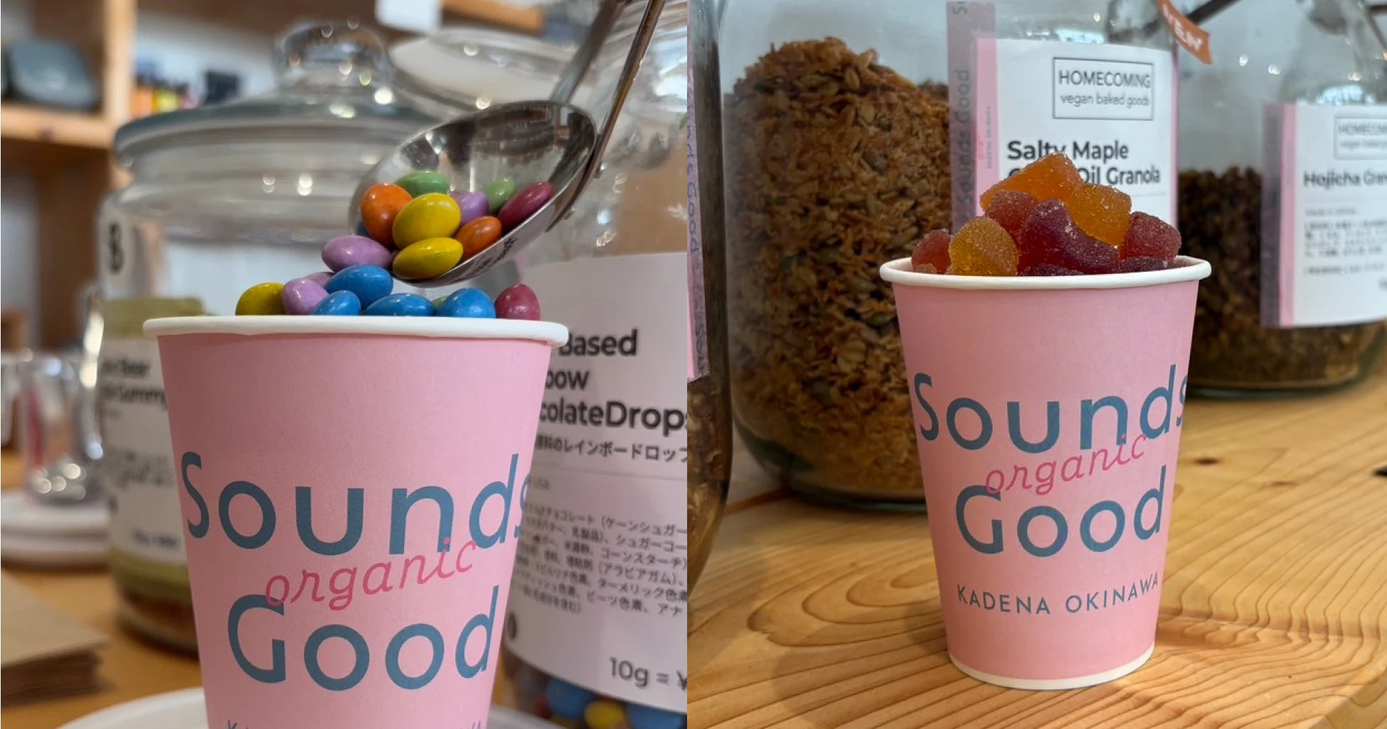 「Sounds organic Good KADENA OKINAWA」のロゴが入ったピンクのカップに、カラフルなチョコレートドロップやグミが入れられている様子を捉えた画像です。背景にはグラノーラの入った瓶が見え、量り売りの店舗の雰囲気が伝わります。